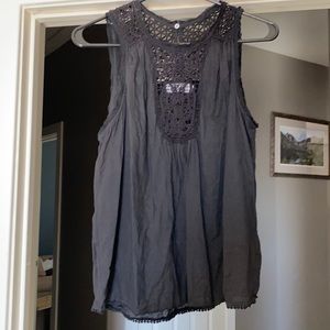 For good black tank blouse. Gorgeous detail